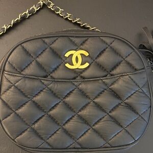 CHANEL Black Quilted Crossbody with Gold Accent
